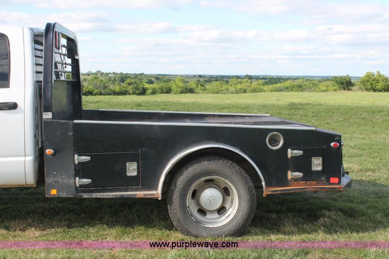 image for item K8917 2007 Dodge Ram 3500HD Quad Cab flatbed pickup truck