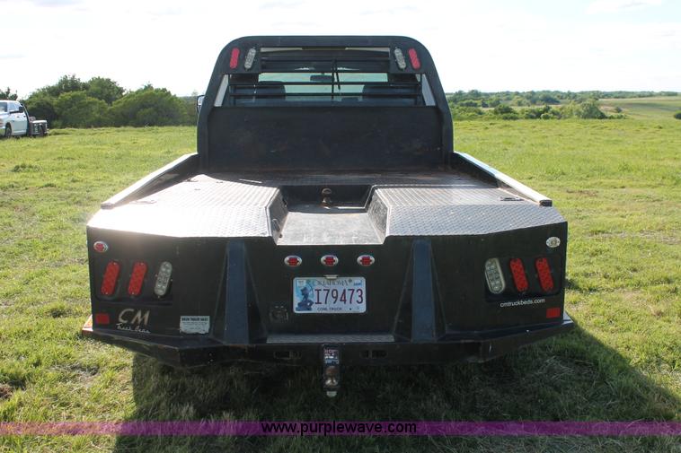 image for item K8917 2007 Dodge Ram 3500HD Quad Cab flatbed pickup truck