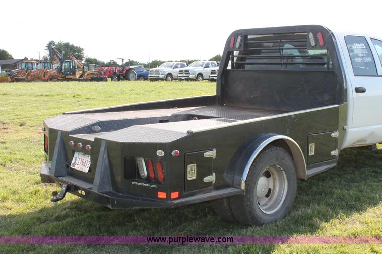 image for item K8917 2007 Dodge Ram 3500HD Quad Cab flatbed pickup truck