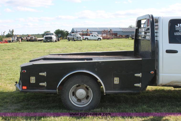 image for item K8917 2007 Dodge Ram 3500HD Quad Cab flatbed pickup truck