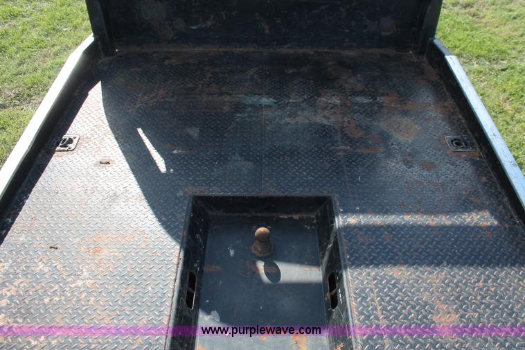 image for item K8917 2007 Dodge Ram 3500HD Quad Cab flatbed pickup truck