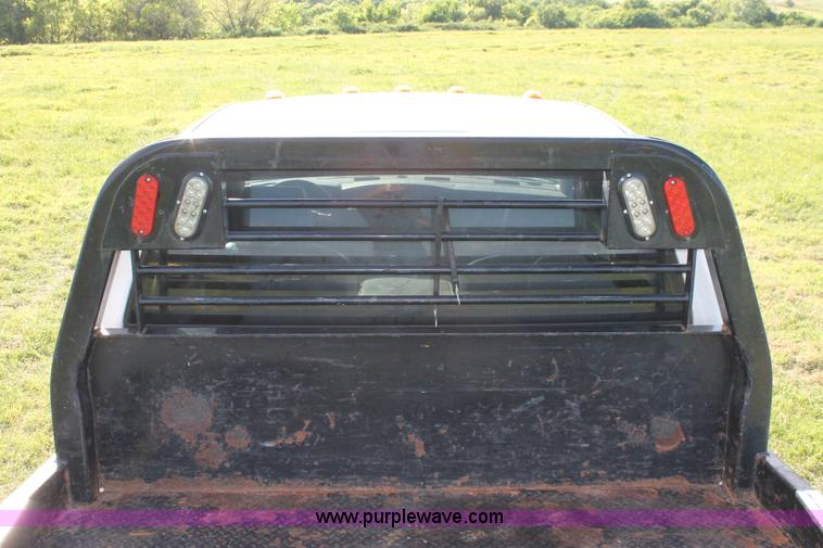 image for item K8917 2007 Dodge Ram 3500HD Quad Cab flatbed pickup truck