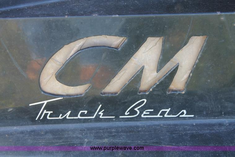 image for item K8917 2007 Dodge Ram 3500HD Quad Cab flatbed pickup truck