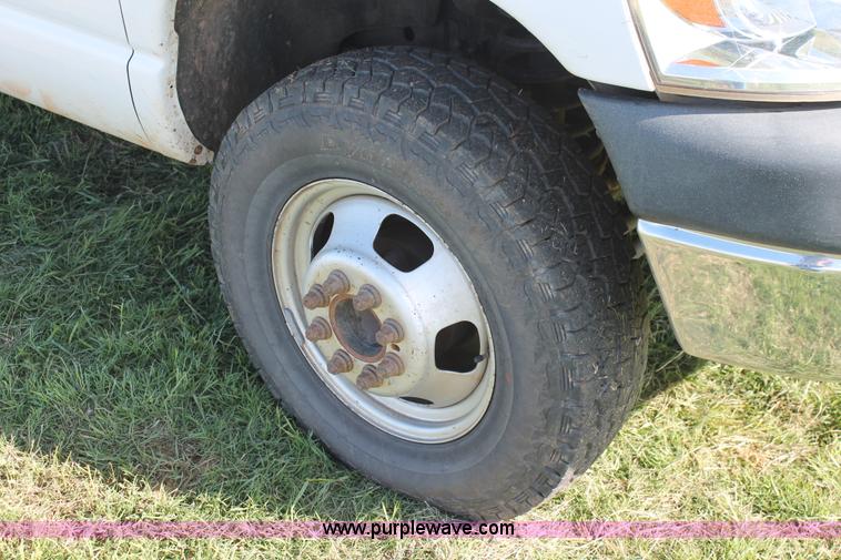 image for item K8917 2007 Dodge Ram 3500HD Quad Cab flatbed pickup truck