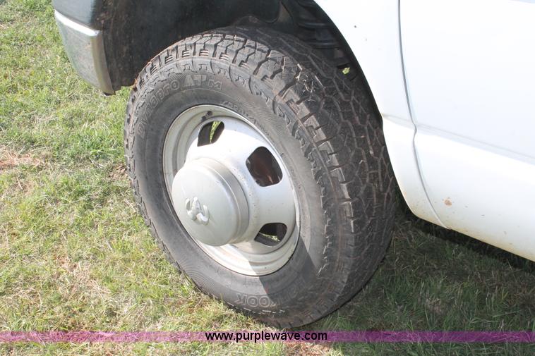 image for item K8917 2007 Dodge Ram 3500HD Quad Cab flatbed pickup truck