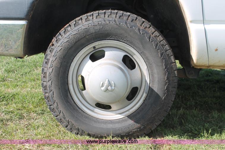 image for item K8917 2007 Dodge Ram 3500HD Quad Cab flatbed pickup truck