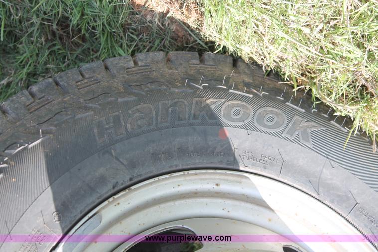 image for item K8917 2007 Dodge Ram 3500HD Quad Cab flatbed pickup truck