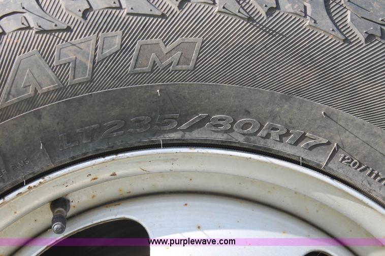 image for item K8917 2007 Dodge Ram 3500HD Quad Cab flatbed pickup truck