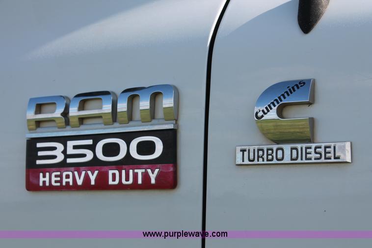 image for item K8917 2007 Dodge Ram 3500HD Quad Cab flatbed pickup truck