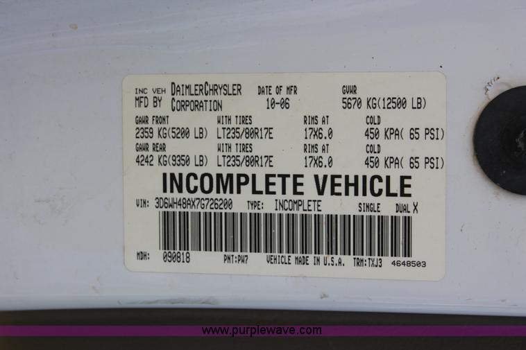 image for item K8917 2007 Dodge Ram 3500HD Quad Cab flatbed pickup truck