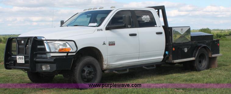 image for item K8918 2011 Dodge Ram 3500HD flatbed pickup truck