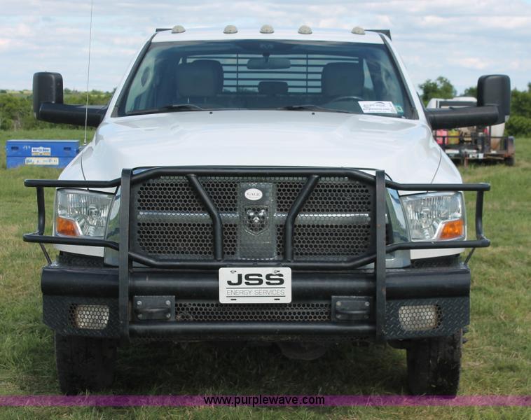 image for item K8918 2011 Dodge Ram 3500HD flatbed pickup truck