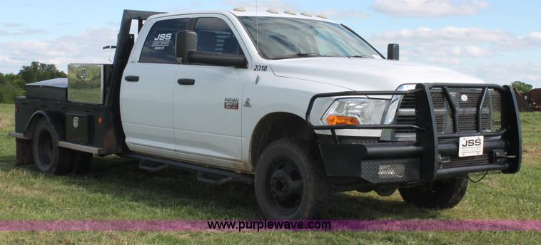image for item K8918 2011 Dodge Ram 3500HD flatbed pickup truck
