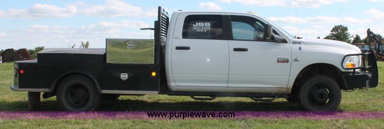image for item K8918 2011 Dodge Ram 3500HD flatbed pickup truck