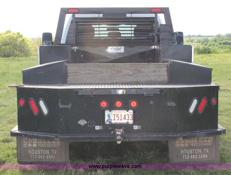 image for item K8918 2011 Dodge Ram 3500HD flatbed pickup truck