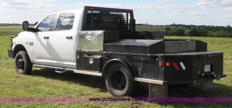 image for item K8918 2011 Dodge Ram 3500HD flatbed pickup truck