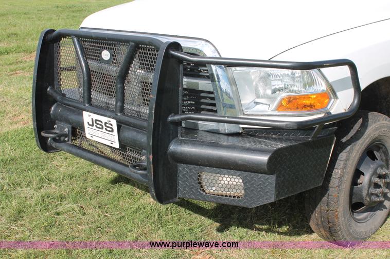 image for item K8918 2011 Dodge Ram 3500HD flatbed pickup truck