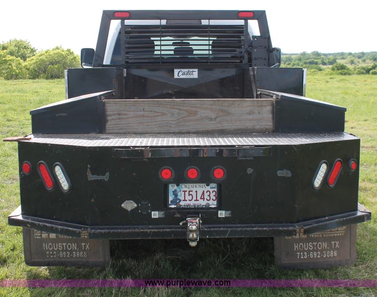 image for item K8918 2011 Dodge Ram 3500HD flatbed pickup truck