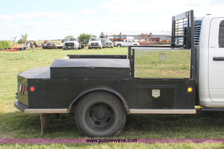 image for item K8918 2011 Dodge Ram 3500HD flatbed pickup truck