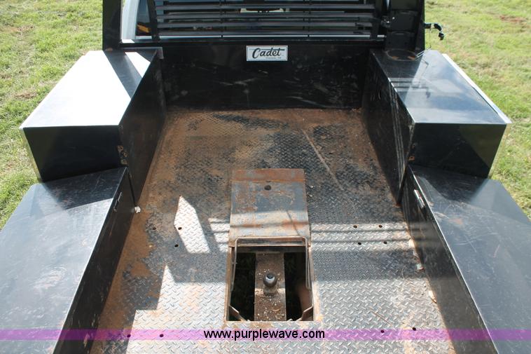 image for item K8918 2011 Dodge Ram 3500HD flatbed pickup truck