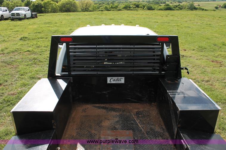 image for item K8918 2011 Dodge Ram 3500HD flatbed pickup truck