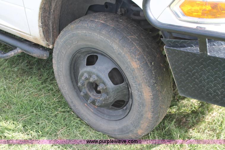 image for item K8918 2011 Dodge Ram 3500HD flatbed pickup truck