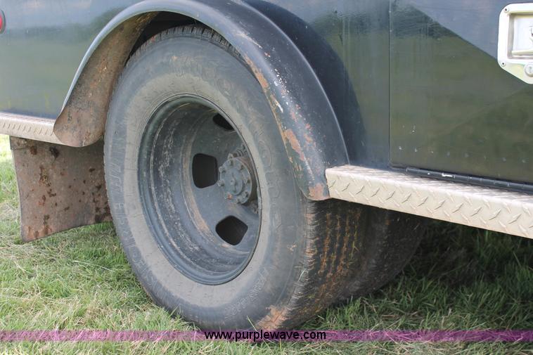 image for item K8918 2011 Dodge Ram 3500HD flatbed pickup truck