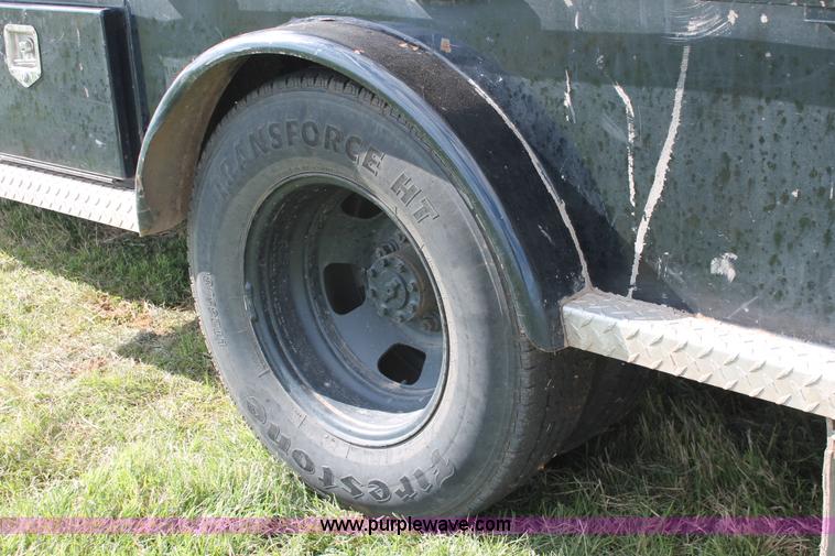 image for item K8918 2011 Dodge Ram 3500HD flatbed pickup truck