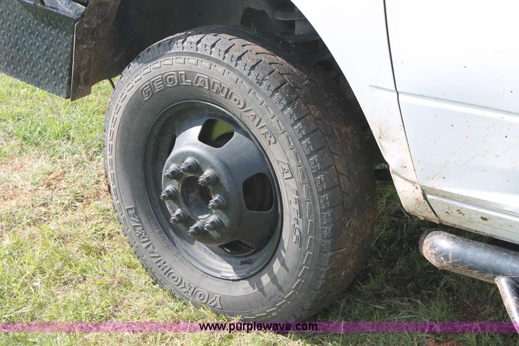 image for item K8918 2011 Dodge Ram 3500HD flatbed pickup truck