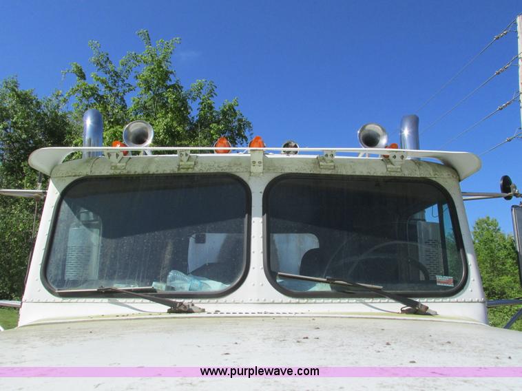 image for item L2005 1987 Freightliner FLC-64T dump truck