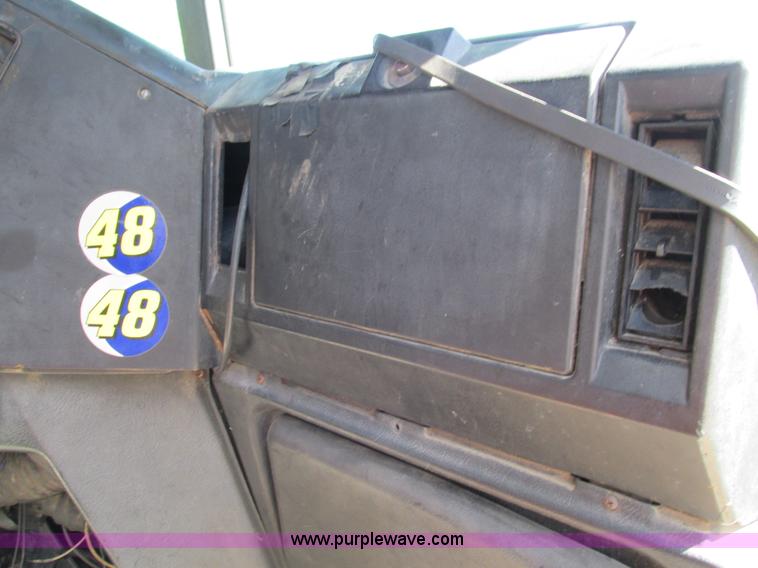 image for item L2005 1987 Freightliner FLC-64T dump truck