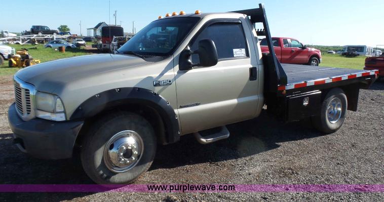 image for item L5824 2000 Ford F350 XL flatbed pickup truck