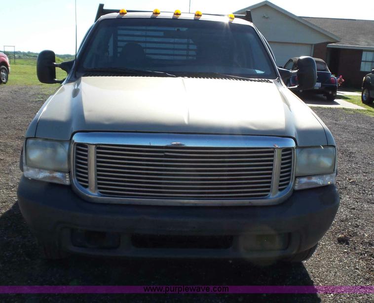 image for item L5824 2000 Ford F350 XL flatbed pickup truck