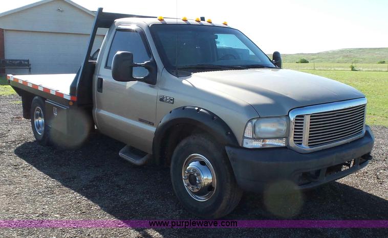 image for item L5824 2000 Ford F350 XL flatbed pickup truck