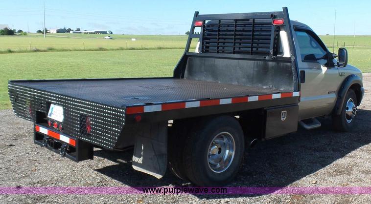 image for item L5824 2000 Ford F350 XL flatbed pickup truck