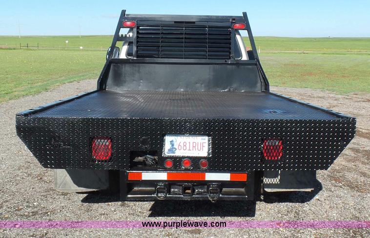 image for item L5824 2000 Ford F350 XL flatbed pickup truck