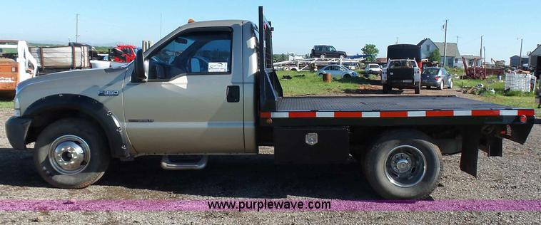 image for item L5824 2000 Ford F350 XL flatbed pickup truck