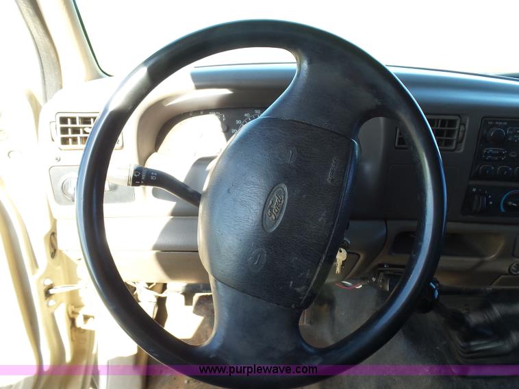 image for item L5824 2000 Ford F350 XL flatbed pickup truck