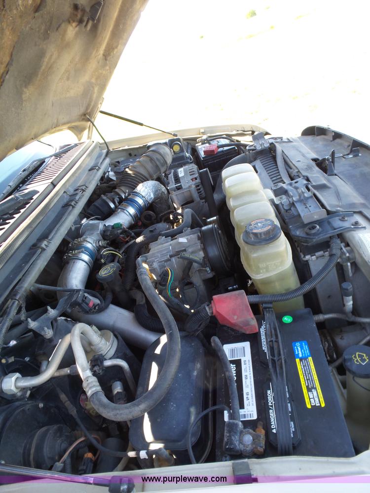 image for item L5824 2000 Ford F350 XL flatbed pickup truck