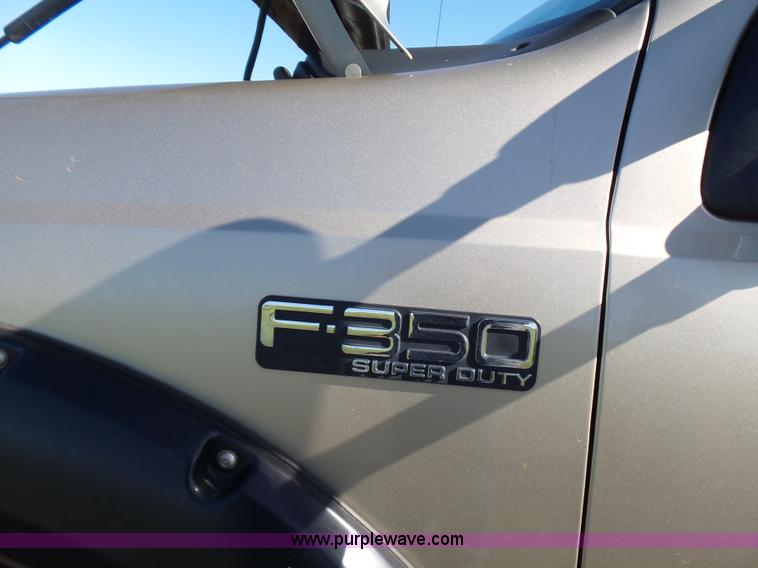 image for item L5824 2000 Ford F350 XL flatbed pickup truck