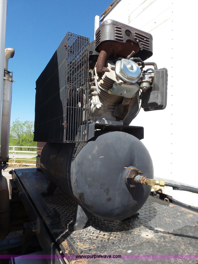 image for item L5825 2002 Sterling M7500 Acterra service truck with crane