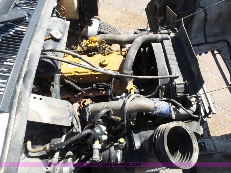 image for item L5825 2002 Sterling M7500 Acterra service truck with crane