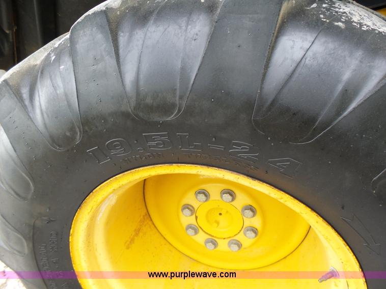 image for item L6054 2004 John Deere 310 SG backhoe