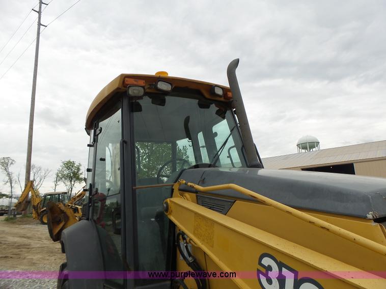 image for item L6054 2004 John Deere 310 SG backhoe