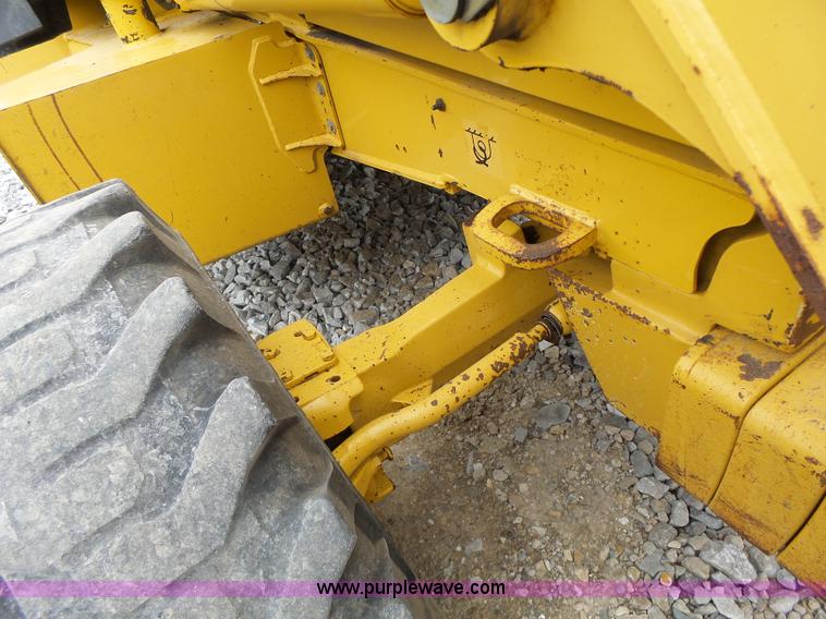 image for item L6054 2004 John Deere 310 SG backhoe