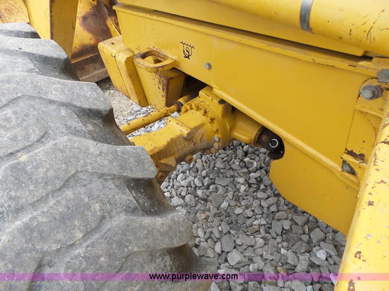 image for item L6054 2004 John Deere 310 SG backhoe