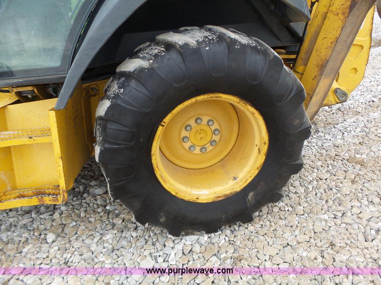 image for item L6054 2004 John Deere 310 SG backhoe