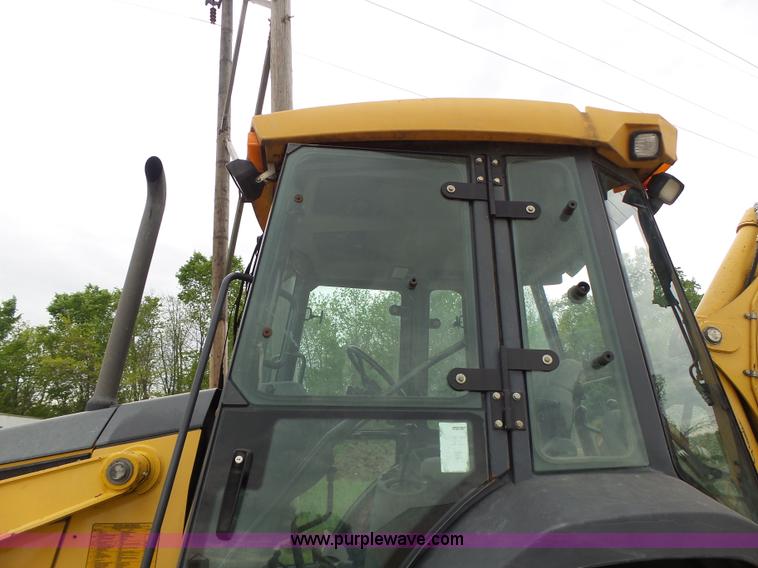 image for item L6054 2004 John Deere 310 SG backhoe