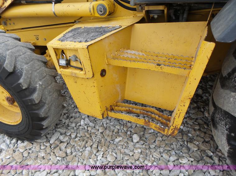 image for item L6054 2004 John Deere 310 SG backhoe