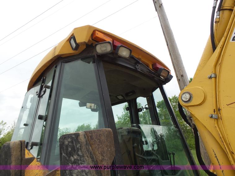 image for item L6054 2004 John Deere 310 SG backhoe